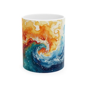 May include: A white ceramic mug with a wraparound watercolour design. The design features a swirling pattern of orange, red, teal, and blue hues, resembling a wave or abstract landscape. The mug has a standard cylindrical shape.