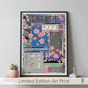 Könnte beinhalten: Gerahmter Kunstdruck mit einem digitalen Design, das japanischen Text und Kirschblüten enthält. Das Kunstwerk hat eine Retro-Computer-Oberflächen-Ästhetik mit rosa und blauen Farbtönen. Der Text "Limited Edition Art Print" befindet sich unten.