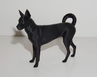 La figura original del perro negro