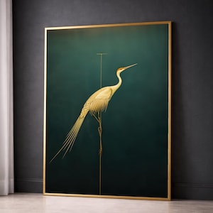 May include: A framed art print featuring a detailed illustration of a crane. The bird is depicted in shades of cream and gold against a deep teal background. The artwork is enclosed in a gold frame, adding a touch of elegance to the piece.