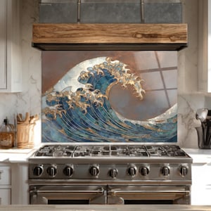 May include: A kitchen backsplash featuring a stylized depiction of a large ocean wave. The wave is rendered in shades of blue and gold, with intricate detailing. The artwork is mounted above a stainless steel gas range.