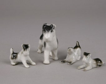 Terrier Dog Family, Porcelain Adult and 3 little "Holy Terriers"  one marked Germany on the base