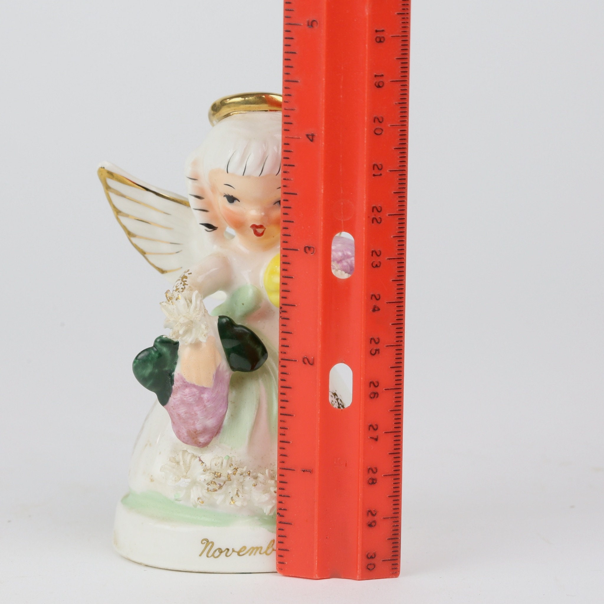 Napco November Angel, Spaghetti Angel S1371, Holding Grapes Napco November Angel, Spaghetti Angel S1371, Holding Grapes