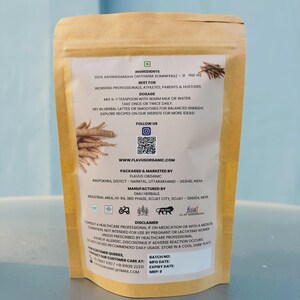 以下が含まれることがあります： Flavus Organic Ashwagandha パウダーが入った茶色の紙袋。袋には、成分、用量、免責事項が記載されています。この製品は、働く専門家、アスリート、親、そしてハスラーを対象としています。