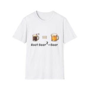 May include: White t-shirt with a graphic that reads "Root Beer² = Beer". The graphic features two cartoon beer mugs, one with root beer and the other with beer. The shirt is a casual, everyday wear item.