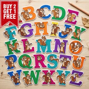 May include: A set of alphabet letters from A to Z, each featuring a cartoon squirrel illustration. The letters are multicolored, including orange, blue, green, purple, and pink. A red sign in the top left corner displays the text BUY 2 GET 1 FREE.
