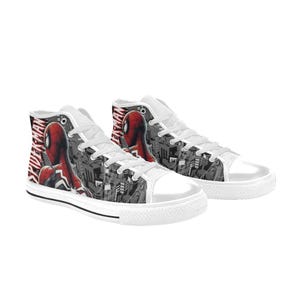 May include: White high-top sneakers featuring a Spider-Man design. The shoes have a red and black Spider-Man graphic on the sides, with the word "Spider-Man" in red and white. The sneakers have white laces and soles.