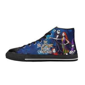 May include: A high-top sneaker featuring a blue background with a graphic print of characters from The Nightmare Before Christmas. The shoe has black laces, a black toe cap, a black sole with a white stripe, and the movie title text in yellow.