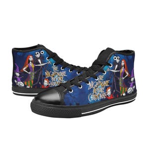 May include: High-top sneakers featuring a blue background with a graphic print of characters from The Nightmare Before Christmas. The shoes have black laces, black toe caps, and black soles, with the movie title text printed in yellow and white.