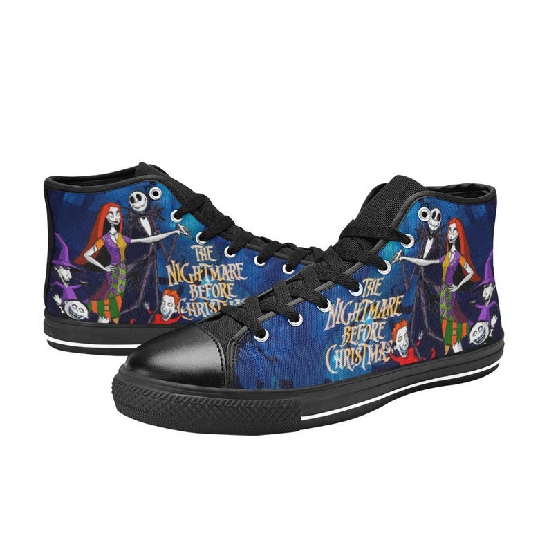May include: High-top sneakers featuring a blue background with a graphic print of characters from The Nightmare Before Christmas. The shoes have black laces, black toe caps, and black soles, with the movie title text printed in yellow and white.