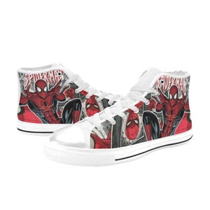 May include: High-top sneakers featuring a white rubber toe cap, white laces, and a graphic print of Spider-Man in red and black. The canvas upper displays comic book style panels with the text Spider-Man visible on the side of the footwear.