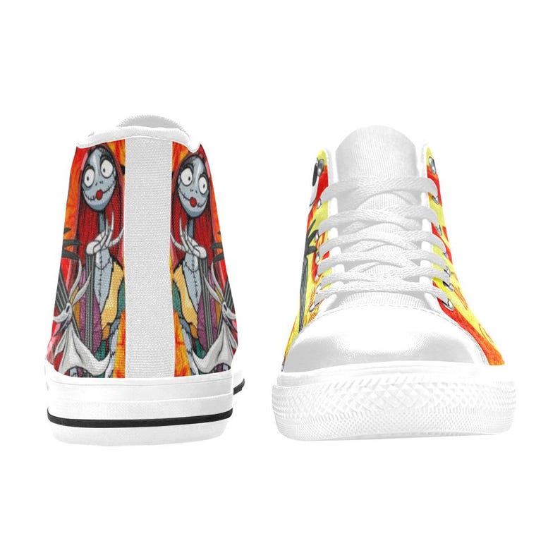 May include: High-top sneakers featuring a vibrant graphic print of a character with long red hair, stitched facial features, and a yellow dress, accompanied by a white ghost dog. The shoes have white laces, white rubber toe caps, and white soles.