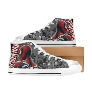 May include: High-top canvas sneakers featuring a Spider-Man design. The shoes have a white rubber sole and laces, with a cityscape pattern and a red and black Spider-Man graphic on the sides. The word "Spider-Man" is printed on the back.
