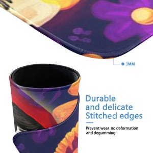 May include: A close-up of a mousepad with a floral design in shades of purple, orange, and yellow. The mousepad has stitched edges and is 3mm thick. The text "Durable and delicate Stitched edges" is visible.