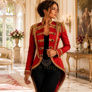 May include: A red military-style jacket featuring gold braided trim, gold fringe epaulets, and black buttons. The jacket has a high collar, long sleeves with gold cuffs, and a structured, tailcoat-inspired silhouette worn over a black top and pants.