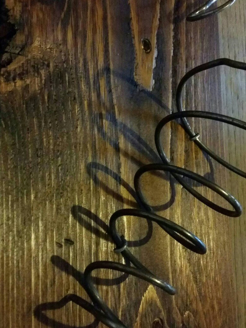 Wall mounted wine rack made with found wood and bed springs Etsy