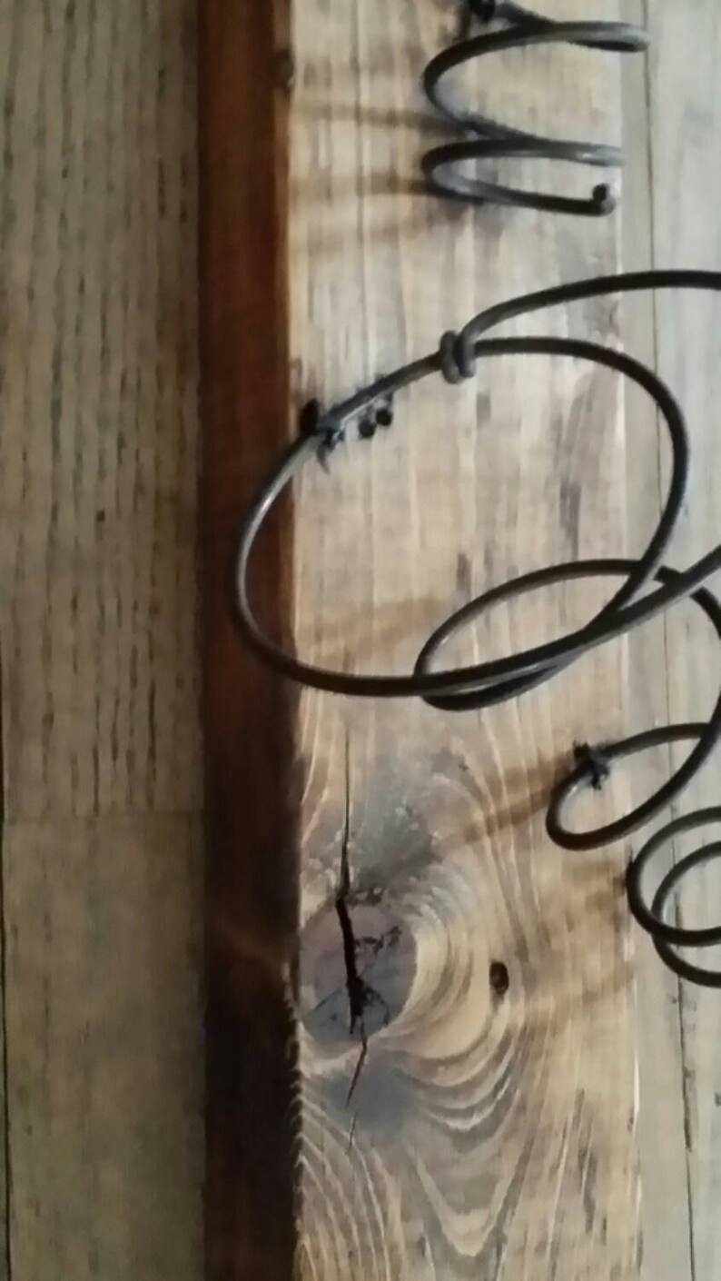 Wall mounted bed spring wine rack Etsy