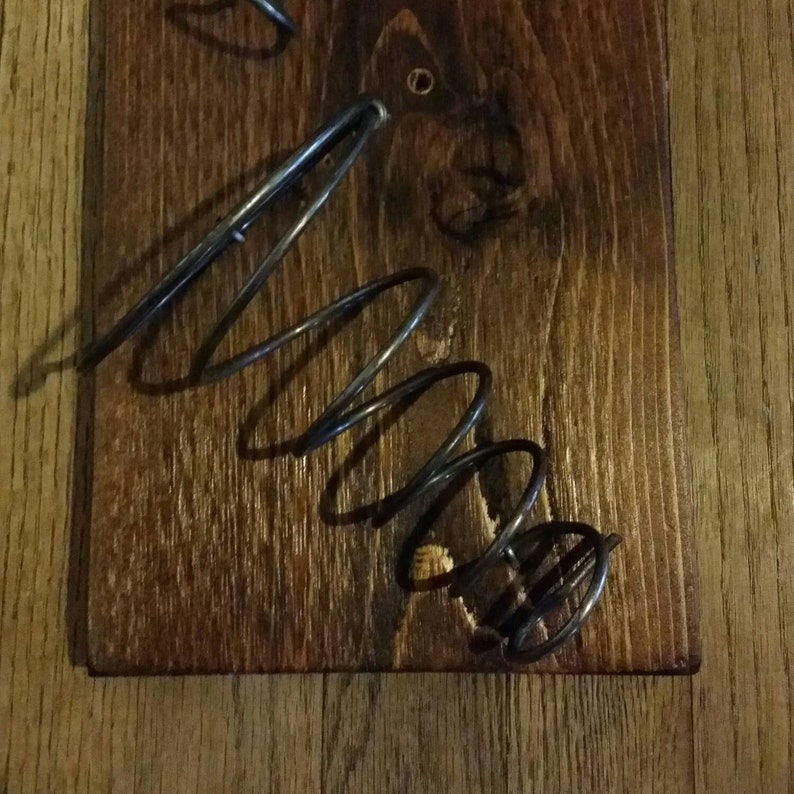 Wall mounted wine rack made with found wood and bed springs Etsy