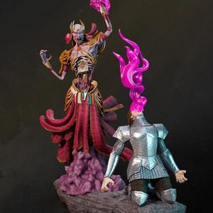 May include: A fantasy figurine set featuring a skeletal figure with a crown and flowing red robes, raising a glowing purple orb. A knight in silver armor kneels before the figure, with a purple flame emanating from their head. The figures stand on a rocky base.