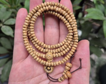 Braccialetto avvolgente con 216 semi di Bodhi