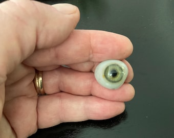 Ojo de cristal acrílico vintage, colección ocularista, prótesis ocular detallada