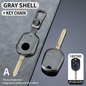 May include: Gray car key shell with a key chain, featuring a black circle and a silver key. The image also shows a car key with five buttons. Text on the image reads "GRAY SHELL + KEY CHAIN" and "5 BUTTONS".