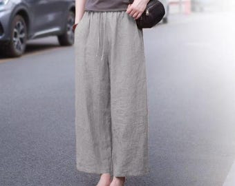 Pantalones de mujer de ramio y algodón de pierna ancha, cintura elástica, estilo casual holgado.