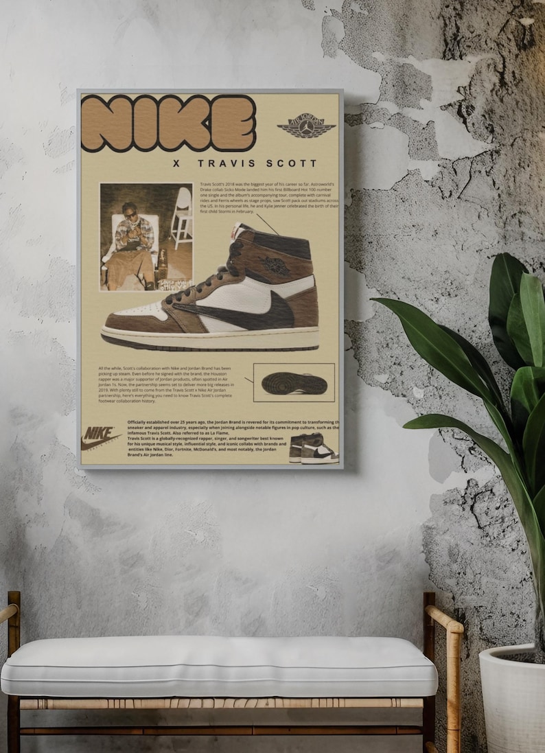 May include: Poster featuring a Nike x Travis Scott collaboration. The poster showcases a high-top sneaker in brown, white, and black. The design includes the Nike logo, the Jordan logo, and a photo of Travis Scott.