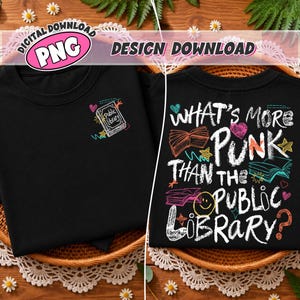 May include: A black t-shirt featuring a small graphic of a book labeled Public Library on the front left chest. The back displays the text What's More Punk Than The Public Library? surrounded by illustrations of books, stars, hearts, and a smiley face.