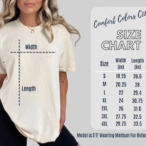 May include: Cream-colored t-shirt with a size chart. The chart lists sizes S to 4XL, with corresponding width and length measurements in inches. The text "Comfort Colors C1717" is at the top. The model is 5'2" and wearing a medium.