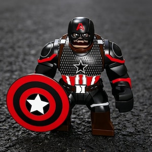 May include: A black and red Captain America action figure with a shield. The figure has a black helmet with a red "A", a star on the chest, and red accents. The shield is red with black concentric circles and a white star.