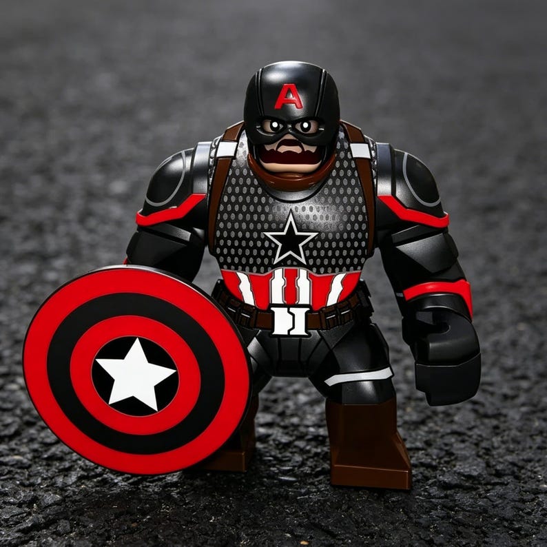 May include: A black and red Captain America action figure with a shield. The figure has a black helmet with a red "A", a star on the chest, and red accents. The shield is red with black concentric circles and a white star.