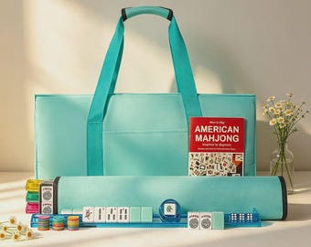 May include: A turquoise Mahjong set featuring a carrying bag, a roll-up mat, translucent blue tile racks, colorful circular chips, and a red instructional book titled American Mahjong Simplified for Beginners with illustrated game tiles.