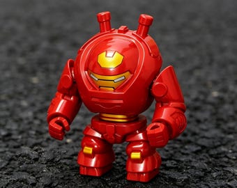 Marvel Hulkbuster Action Figure: red metal-finish plastic, 360 armor print, glossy surface, integrated helmet — for collectors & fans