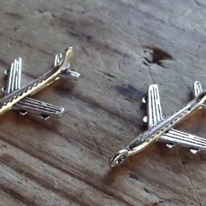 2 silver tone Airliner Charms / miniature  plane / Jewelry Supplies / Findings / altered art supplies / mixed media / airplane / jet