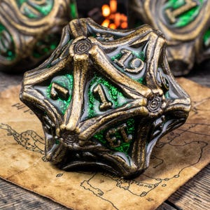 May include: A bronze and green polyhedral die with intricate detailing and numbers. The die is set on a vintage map, showcasing a blend of fantasy and historical aesthetics. The numbers are in a classic font.