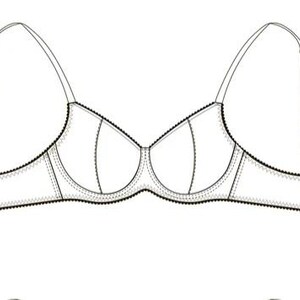 May include: A white bra with adjustable straps and a classic design. The bra features a structured silhouette with seaming details and a scalloped edge along the bottom. The straps are thin and adjustable.