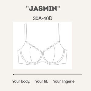 May include: Line drawing of a bra with adjustable straps and scalloped trim along the top edge. The text "JASMIN" is above the bra, with "30A-40D" below it. The phrase "Your body. Your fit. Your lingerie" is at the bottom.