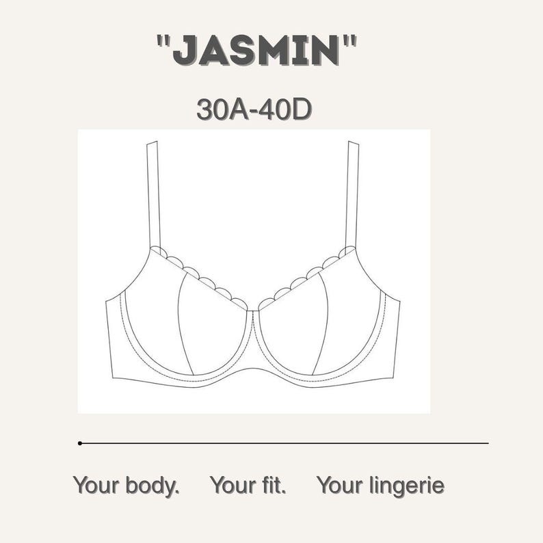 May include: Line drawing of a bra with adjustable straps and scalloped trim along the top edge. The text "JASMIN" is above the bra, with "30A-40D" below it. The phrase "Your body. Your fit. Your lingerie" is at the bottom.