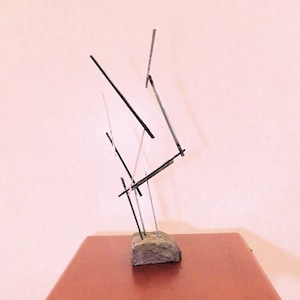Steel and stone or rock sculpture