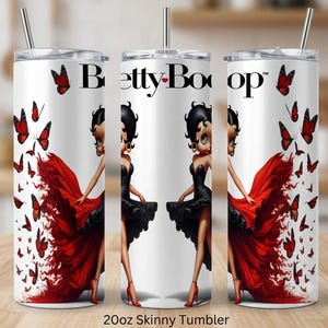 May include: A 20oz skinny tumbler with a white background featuring the text Betty Boop. The design displays a character with black hair in a black dress, surrounded by numerous red butterflies. The tumbler includes a lid and a metal straw.