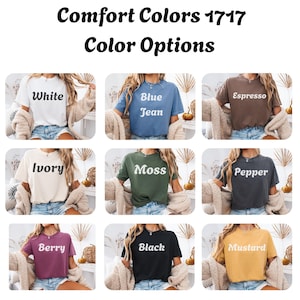 May include: A selection of Comfort Colors 1717 t-shirts in various colors, including white, blue jean, espresso, ivory, moss, pepper, berry, black, and mustard. Each shirt is displayed with its color name in a white, retro font.