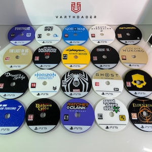 May include: A collection of colorful PS5 game disc covers featuring titles like "Fortnite," "God of War," and "Elden Ring." Each disc has a central hole and game title text. The Varthdader logo is visible in the background.