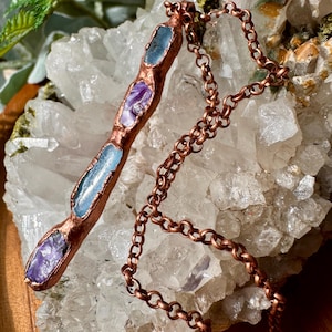 May include: A rustic wooden sign with the text "Welcome to our porch" in white lettering. The sign features a distressed finish and a simple, inviting design, perfect for outdoor decor.