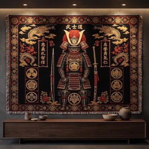 May include: A rectangular woven wall tapestry featuring a central samurai figure in traditional armor, flanked by a spear and a katana. The black background is decorated with gold dragons, red flowers, Japanese kanji text, and circular crests.