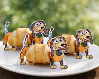Decorazioni per cupcake a tema Toy Story con i maialini Slinky su una coperta (PDF, PNG)