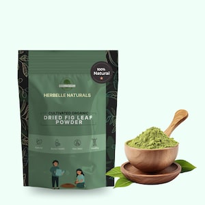 May include: A green package of Herbelle Naturals Cultivated Organic Dried Fig Leaf Powder. A wooden bowl with a wooden spoon is filled with green powder. The package has the words "100% Natural" and illustrations of people gardening.