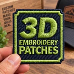 May include: A square embroidered patch with a dark navy blue background and a lime green border. The patch features the lime green text 3D EMBROIDERY PATCHES in a bold, raised font style, centered within the decorative lime green frame.