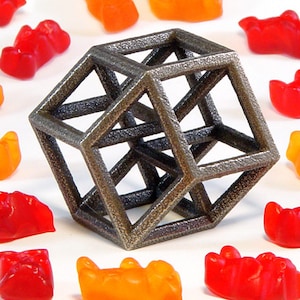 Hypercube Sculpture -- elegant math geometry art in 3D printed steel, handheld or keychain size