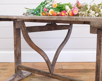A French pine vigneron’s tilt-top table Mid-19th century